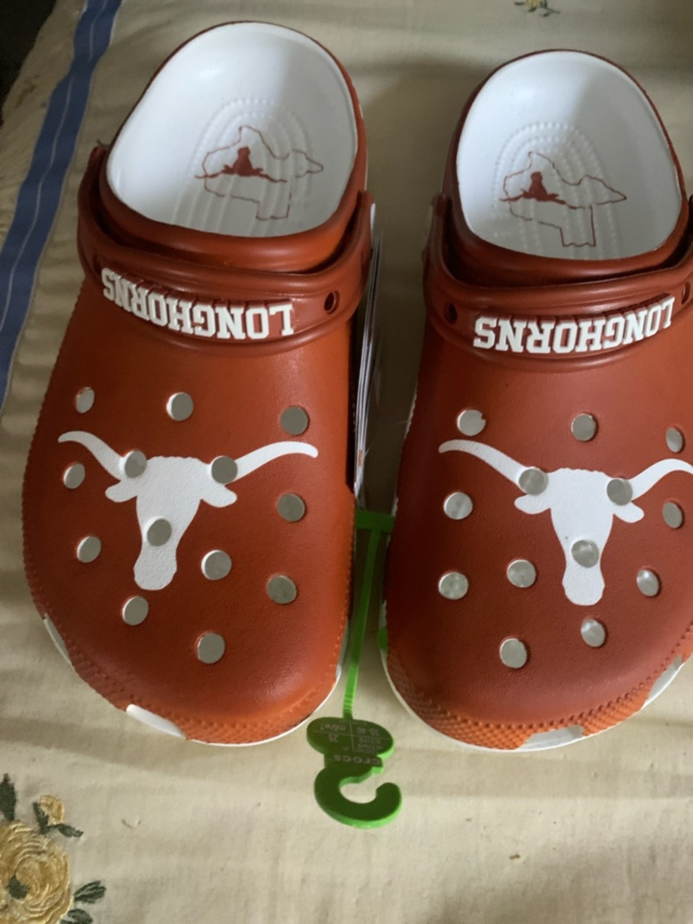 CROCS Kids Clog Sandals in Burnt Orange with White Longhorn Logo